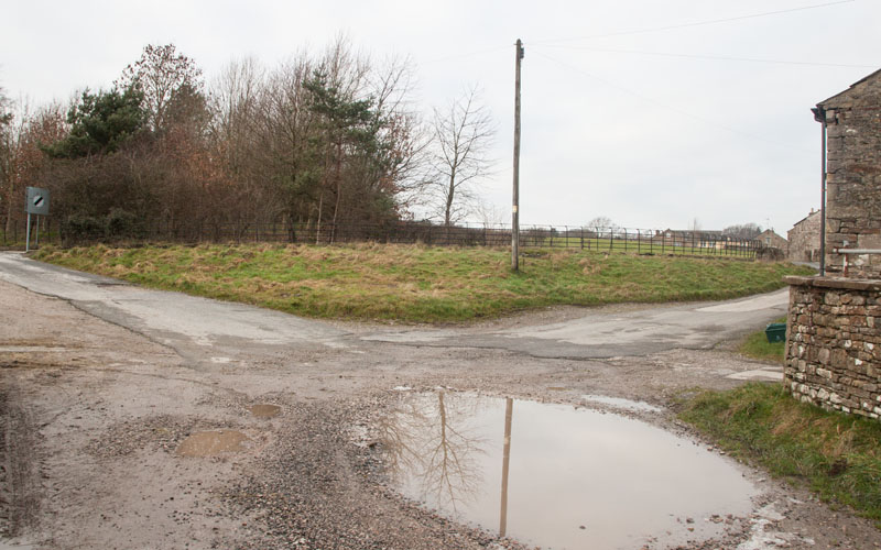 junction of Burrow Mill Lane with B6254, Whittington