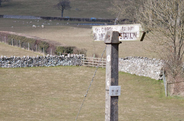 signpost on The Row, Silverdale