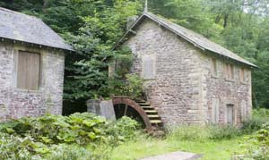 derelict water mill, by River Wye near Ashford