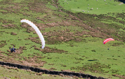 Paragliders take the quick way down pendle Hill